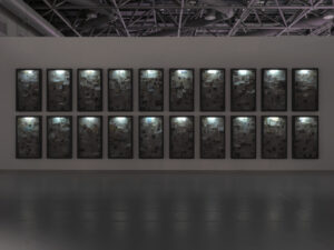 Instalación artística en la feria Can Art Fair Madrid con múltiples cuadros iluminados