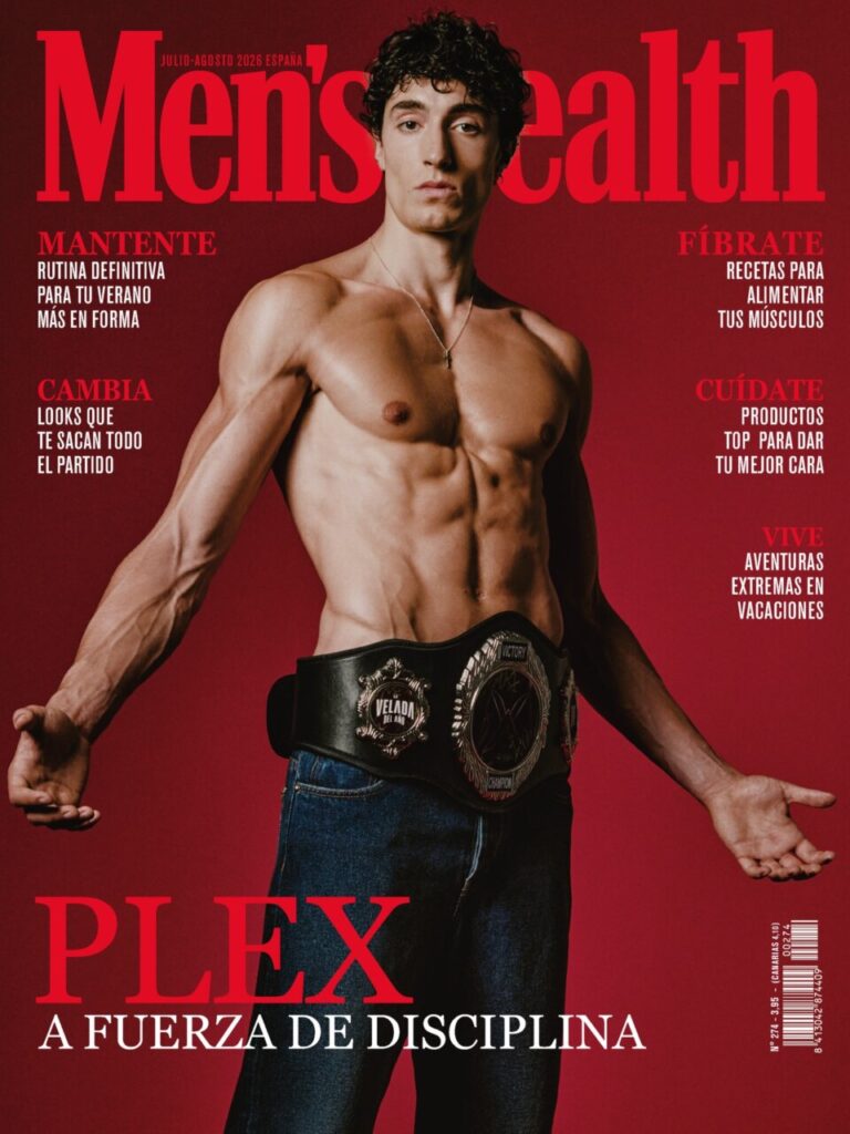 Portada de la revista Men's Health con un modelo musculoso y cinturón de campeón